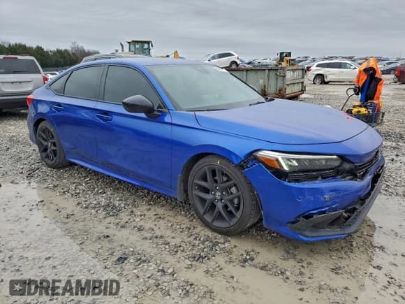 ✅ 2023 Honda Civic Sport • VIN: 2HGFE2F57PH565444 • Лот: 94899775. Опубликован ранее на Copart с пробегом 20 995 миль. Бесплатный доступ к архиву аукционных продаж из США и подробный отчёт об истории автомобиля на DreamBid. Изображение 4.