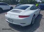 ✅ 2014 Porsche 911 Carrera • VIN: WP0AA2A95ES107695 • Lot: 42498947. Listed on IAAI with 67,200 mi. Free auction sales archive from the USA and detailed vehicle history report at DreamBid. Image 4.