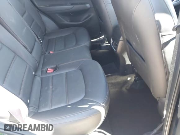 ✅ 2023 Mazda CX-5 S Carbon Edition • VIN: JM3KFBCMXP0282649 • Lot: 42784337. Listed on IAAI with 25,589 mi. Free auction sales archive from the USA and detailed vehicle history report at DreamBid. Image 8.