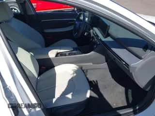 2025 Hyundai Sonata SEL with VIN KMHL64JA7SA486406, listed as a IAAI auction lot 43503569 with 15,107 mi miles and . Bid and sale history available at DreamBid. Image 5.