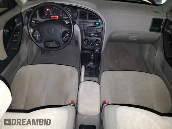 2002 Hyundai Elantra GLS z VIN KMHDN45D72U460530, wystawiony jako Copart lot #81283554 z przebiegiem 125 827 mil mil oraz Szkoda całkowita • Salvage title. Historia ofert i sprzedaży dostępna na DreamBid. Obrazek 8.