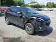 2014 Hyundai Tucson Walking Dead Edition with VIN KM8JUCAG8EU936627, listed as a Copart auction lot 56313984 with 109,412 mi miles and Salvage title. Bid and sale history available at DreamBid. Image 4.