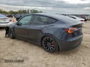 ✅ 2024 Tesla Model Y Performance • VIN: 7SAYGDEF1RF029818 • Lot: 95717335. Wystawiony na Copart z przebiegiem 27 776 mil. Bezpłatny archiwum sprzedaży aukcyjnych z USA i szczegółowy raport historii pojazdu na DreamBid. Zdjęcie 2.