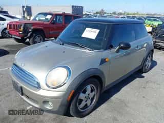 2008 MINI Hardtop with VIN WMWMF33508TT60207, listed as a IAAI auction lot 42328388 with 107,898 mi miles and . Bid and sale history available at DreamBid. Image 2.