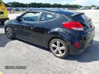 2015 Hyundai Veloster with VIN KMHTC6AD6FU229384, listed as a IAAI auction lot 43347439 with 144,004 mi miles and . Bid and sale history available at DreamBid. Image 3.