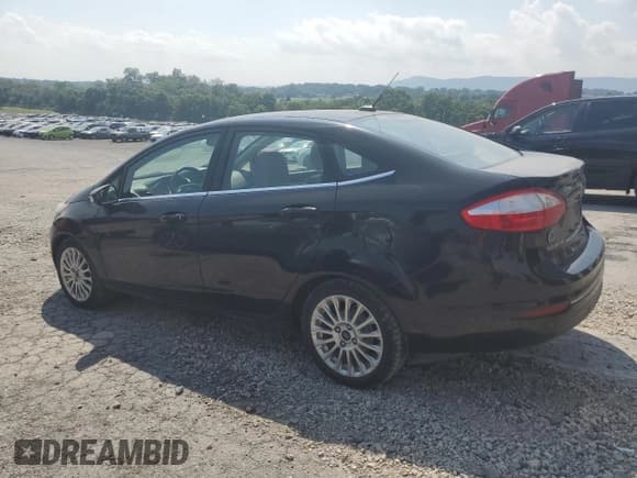 ✅ 2015 Ford Fiesta Titanium • VIN: 3FADP4CJ1FM122581 • Lot: 65582565. Wystawiony na Copart z przebiegiem 107 451 mil. Bezpłatny archiwum sprzedaży aukcyjnych z USA i szczegółowy raport historii pojazdu na DreamBid. Zdjęcie 2.