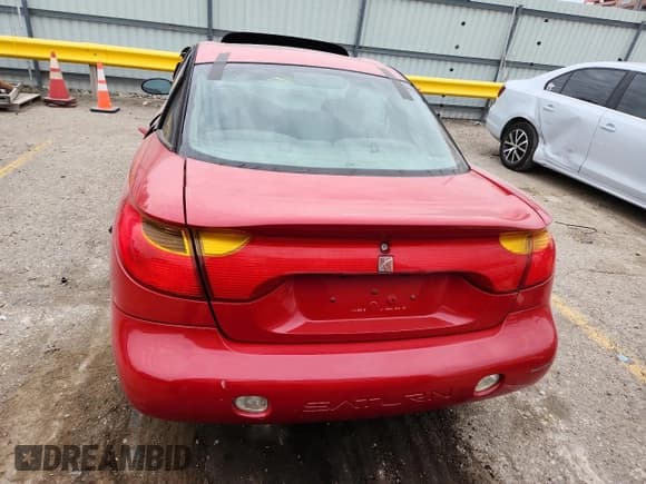 ✅ 2001 Saturn SC • VIN: 1G8ZY12701Z225347 • Лот: 90816705. Опубликован ранее на Copart с пробегом 148 414 миль. Бесплатный доступ к архиву аукционных продаж из США и подробный отчёт об истории автомобиля на DreamBid. Изображение 6.