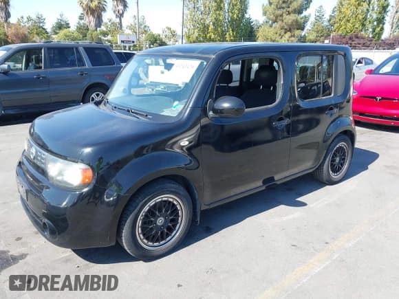 ✅ 2009 Nissan Cube S • VIN: JN8AZ28RX9T112992 • Лот: 43243420. Опубликован ранее на IAAI с пробегом 144 040 миль. Бесплатный доступ к архиву аукционных продаж из США и подробный отчёт об истории автомобиля на DreamBid. Изображение 2.