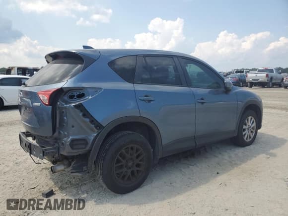 ✅ 2014 Mazda CX-5 Sport • VIN: JM3KE2BE6E0394956 • Lot: 81627465. Listed on Copart with 123,135 mi. Free auction sales archive from the USA and detailed vehicle history report at DreamBid. Image 3.