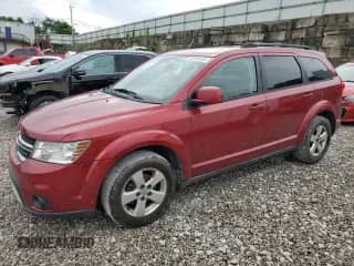 2011 Dodge Journey SXT с VIN 3D4PG5FG3BT564357, выставлен на аукционе Copart как лот 64993325 с пробегом 189 653 миль миль и Списание • Salvage title. История ставок и продаж доступна на DreamBid. Изображение 1.