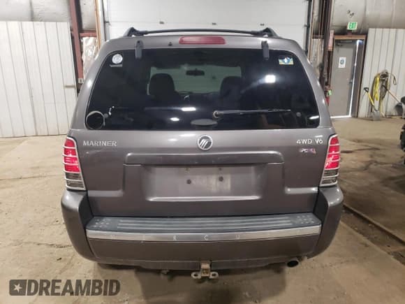 ✅ 2006 Mercury Mariner Luxury • VIN: 4M2YU57166KJ07595 • Лот: 73888354. Опубликован ранее на Copart с пробегом 129 284 миль. Бесплатный доступ к архиву аукционных продаж из США и подробный отчёт об истории автомобиля на DreamBid. Изображение 6.