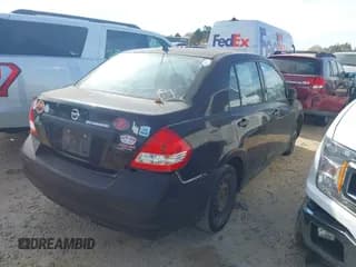 ✅ 2011 Nissan Versa 1.6 • VIN: 3N1CC1AP5BL412848 • Lot: 43737036. Listed on IAAI with 102,169 mi. Free auction sales archive from the USA and detailed vehicle history report at DreamBid. Image 4.