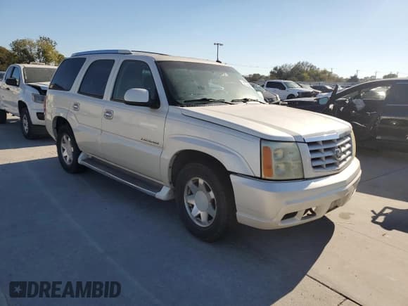 ✅ 2002 Cadillac Escalade • VIN: 1GYEC63T62R319689 • Lot: 76974964. Wystawiony na Copart z przebiegiem 373 704 mil. Bezpłatny archiwum sprzedaży aukcyjnych z USA i szczegółowy raport historii pojazdu na DreamBid. Zdjęcie 4.