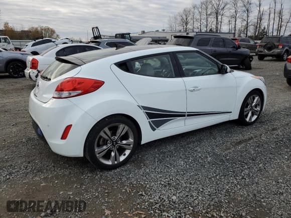✅ 2013 Hyundai Veloster w/Gray Int • VIN: KMHTC6AD9DU123900 • Lot: 79906394. Wystawiony na Copart z przebiegiem 103 950 mil. Bezpłatny archiwum sprzedaży aukcyjnych z USA i szczegółowy raport historii pojazdu na DreamBid. Zdjęcie 3.