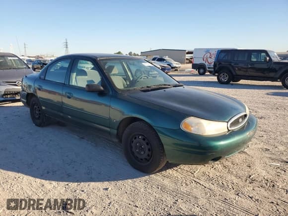 ✅ 1998 Ford Contour • VIN: 1FAFP65L2WK235594 • Лот: 81118614. Опубликован ранее на Copart с пробегом 62 140 миль. Бесплатный доступ к архиву аукционных продаж из США и подробный отчёт об истории автомобиля на DreamBid. Изображение 4.