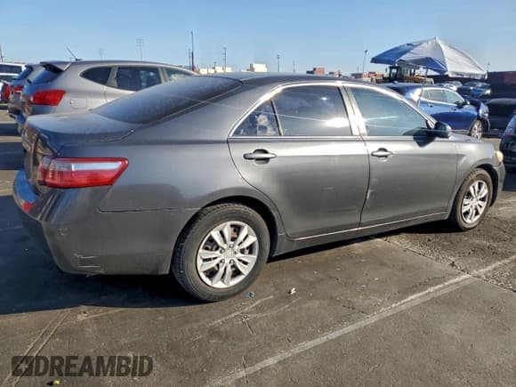 ✅ 2007 Toyota Camry LE • VIN: 4T1BE46K97U152447 • Lot: 95094045. Wystawiony na Copart z przebiegiem 191 066 mil. Bezpłatny archiwum sprzedaży aukcyjnych z USA i szczegółowy raport historii pojazdu na DreamBid. Zdjęcie 3.