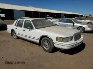 ✅ 1994 Lincoln Town Car Signature • VIN: 1LNLM82W3RY633555 • Lot: 81430533. Listed on Copart with 202,350 mi. Free auction sales archive from the USA and detailed vehicle history report at DreamBid. Image 4.