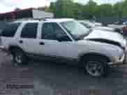 2000 Chevrolet Blazer LS z VIN 1GNCS13W8Y2126188, wystawiony jako IAAI lot #42295713 z przebiegiem 237 340 mil mil oraz . Historia ofert i sprzedaży dostępna na DreamBid. Obrazek 14.