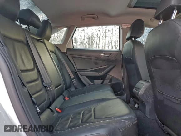 ✅ 2021 Volkswagen Jetta SEL Premium • VIN: 3VWG57BU2MM054005 • Lot: 95281895. Listed on Copart with 96,322 mi. Free auction sales archive from the USA and detailed vehicle history report at DreamBid. Image 10.