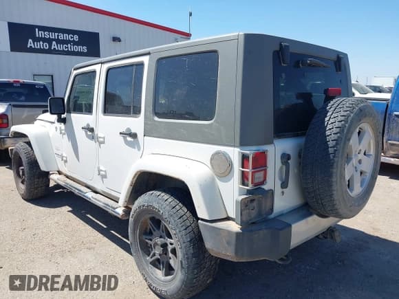 ✅ 2010 Jeep Wrangler Unlimited Sahara • VIN: 1J4HA5H19AL215395 • Лот: 43199080. Опубликован ранее на IAAI с пробегом 206 729 миль. Бесплатный доступ к архиву аукционных продаж из США и подробный отчёт об истории автомобиля на DreamBid. Изображение 3.