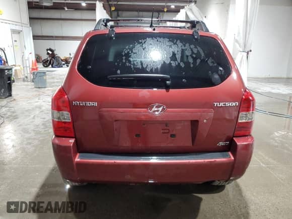 2006 Hyundai Tucson GL z VIN KM8JM72B56U386766, wystawiony jako Copart lot #60782265 z przebiegiem 116 167 mil mil oraz Szkoda całkowita • Salvage title. Historia ofert i sprzedaży dostępna na DreamBid. Obrazek 6.