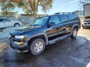 ✅ 2004 Chevrolet Suburban LT • VIN: 3GNFK16Z34G266492 • Lot: 90103875. Listed on Copart with 215,482 mi. Free auction sales archive from the USA and detailed vehicle history report at DreamBid. Image 1.