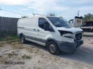 ✅ 2016 Ford Transit Cargo • VIN: 1FTYR1YM0GKA86155 • Lot: 41840237. Listed on IAAI with 192,125 mi. Free auction sales archive from the USA and detailed vehicle history report at DreamBid. Image 1.