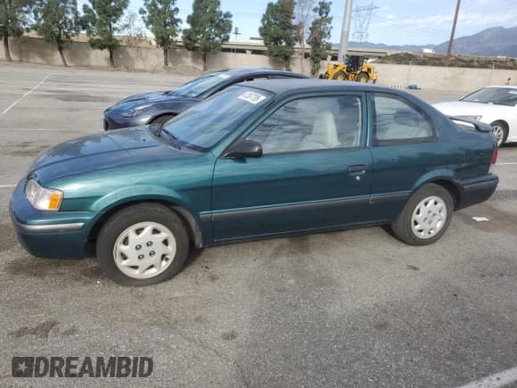 ✅ 1998 Toyota Tercel DX • VIN: JT2AC52L5W0338284 • Лот: 47397795. Опубликован ранее на Copart с пробегом 21 314 миль. Бесплатный доступ к архиву аукционных продаж из США и подробный отчёт об истории автомобиля на DreamBid. Изображение 1.