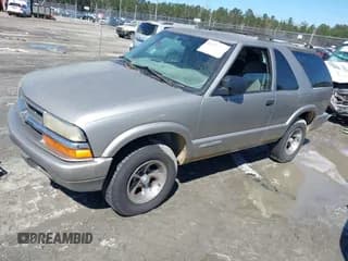 ✅ 2004 Chevrolet Blazer LS • VIN: 1GNCS18X04K112779 • Lot: 41759646. Wystawiony na IAAI z przebiegiem 252 712 mil. Bezpłatny archiwum sprzedaży aukcyjnych z USA i szczegółowy raport historii pojazdu na DreamBid. Zdjęcie 2.