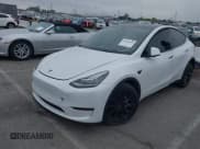 ✅ 2023 Tesla Model Y Long Range • VIN: 7SAYGDEE3PA055497 • Lot: 42396529. Listed on IAAI with 18,230 mi. Free auction sales archive from the USA and detailed vehicle history report at DreamBid. Image 2.