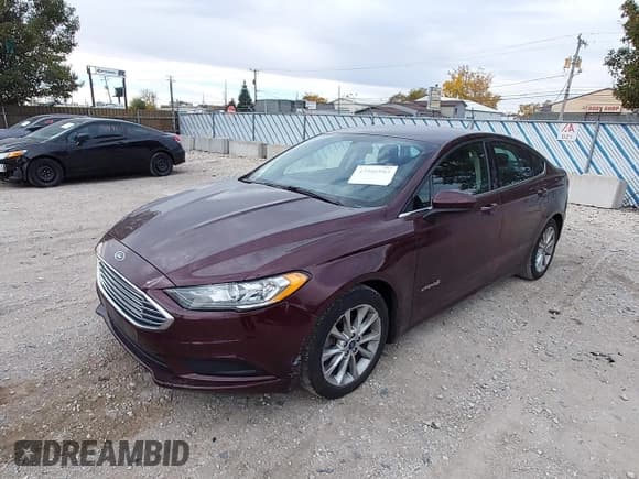 ✅ 2017 Ford Fusion Hybrid SE • VIN: 3FA6P0LU8HR244887 • Лот: 43586983. Опубликован ранее на IAAI с пробегом 140 571 миль. Бесплатный доступ к архиву аукционных продаж из США и подробный отчёт об истории автомобиля на DreamBid. Изображение 2.