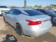 ✅ 2018 Nissan Maxima S • VIN: 1N4AA6AP4JC381275 • Lot: 43589097. Listed on IAAI with 104,348 mi. Free auction sales archive from the USA and detailed vehicle history report at DreamBid. Image 3.