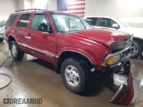 1997 Chevrolet Blazer LS z VIN 1GNDT13W8V2213716, wystawiony jako Copart lot #82782044 z przebiegiem 158 565 mil mil oraz Szkoda całkowita • Salvage title. Historia ofert i sprzedaży dostępna na DreamBid. Obrazek 4.