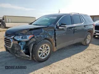 ✅ 2021 Chevrolet Traverse LT Cloth • VIN: 1GNERGKW4MJ193086 • Лот: 68946075. Опубликован ранее на Copart с пробегом 100 096 миль. Бесплатный доступ к архиву аукционных продаж из США и подробный отчёт об истории автомобиля на DreamBid. Изображение 1.