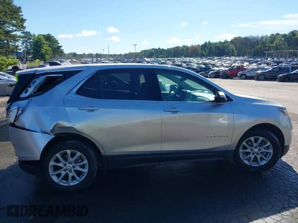 2020 Chevrolet Equinox LT z VIN 3GNAXKEV7LS598821, wystawiony jako IAAI lot #43088697 z przebiegiem 49 107 mil mil oraz . Historia ofert i sprzedaży dostępna na DreamBid. Obrazek 13.