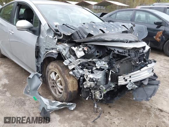 ✅ 2021 Toyota Prius LE • VIN: JTDKAMFP0M3194485 • Lot: 42019500. Listed on IAAI with 42,191 mi. Free auction sales archive from the USA and detailed vehicle history report at DreamBid. Image 6.