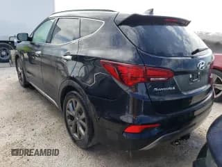 ✅ 2017 Hyundai Santa Fe Ultimate • VIN: 5NMZWDLA3HH044930 • Лот: 62676072. Опубликован ранее на Copart с пробегом 57 027 миль. Бесплатный доступ к архиву аукционных продаж из США и подробный отчёт об истории автомобиля на DreamBid. Изображение 3.