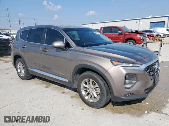 ✅ 2019 Hyundai Santa Fe SE • VIN: 5NMS23ADXKH097314 • Lot: 80940485. Listed on Copart with 114,759 mi. Free auction sales archive from the USA and detailed vehicle history report at DreamBid. Image 4.