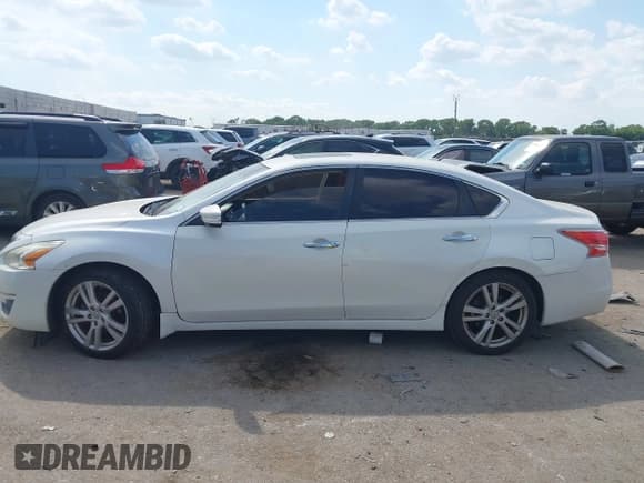 ✅ 2013 Nissan Altima SL • VIN: 1N4BL3AP0DC913140 • Lot: 42977820. Listed on IAAI with 128,400 mi. Free auction sales archive from the USA and detailed vehicle history report at DreamBid. Image 14.