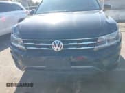 ✅ 2021 Volkswagen Tiguan S • VIN: 3VV1B7AX5MM038606 • Lot: 43170816. Wystawiony na IAAI z przebiegiem 58 393 mil. Bezpłatny archiwum sprzedaży aukcyjnych z USA i szczegółowy raport historii pojazdu na DreamBid. Zdjęcie 6.