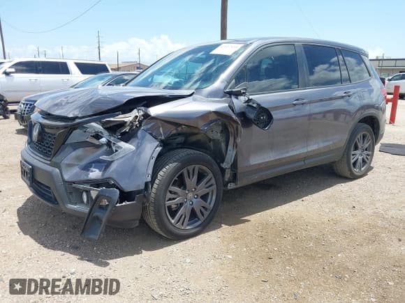 ✅ 2021 Honda Passport EX-L • VIN: 5FNYF8H52MB024467 • Lot: 42427539. Listed on IAAI with 75,652 mi. Free auction sales archive from the USA and detailed vehicle history report at DreamBid. Image 2.