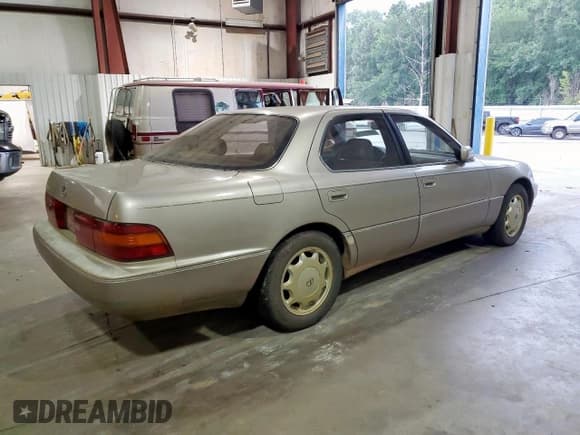 ✅ 1993 Lexus LS • VIN: JT8UF11E0P0162428 • Lot: 60914765. Listed on Copart with 151,801 mi. Free auction sales archive from the USA and detailed vehicle history report at DreamBid. Image 3.