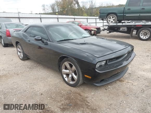 ✅ 2013 Dodge Challenger SXT • VIN: 2C3CDYAG3DH530898 • Lot: 43736090. Listed on IAAI with 184,353 mi. Free auction sales archive from the USA and detailed vehicle history report at DreamBid. Image 1.