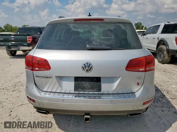 ✅ 2013 Volkswagen Touareg Sport • VIN: WVGEP9BP0DD013339 • Лот: 82204715. Опубликован ранее на Copart с пробегом 159 425 миль. Бесплатный доступ к архиву аукционных продаж из США и подробный отчёт об истории автомобиля на DreamBid. Изображение 6.