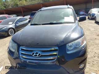 2012 Hyundai Santa Fe Limited z VIN 5XYZK3AB8CG131257, wystawiony jako IAAI lot #43444042 z przebiegiem 90 517 mil mil oraz . Historia ofert i sprzedaży dostępna na DreamBid. Obrazek 6.