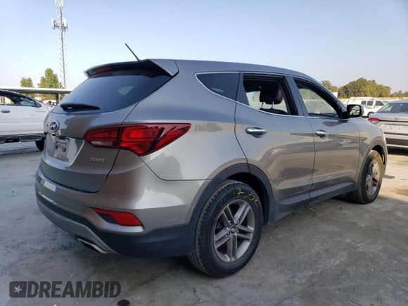 ✅ 2018 Hyundai Santa Fe 2.4L • VIN: 5NMZT3LB6JH095209 • Лот: 66211623. Опубликован ранее на Copart с пробегом 57 947 миль. Бесплатный доступ к архиву аукционных продаж из США и подробный отчёт об истории автомобиля на DreamBid. Изображение 3.