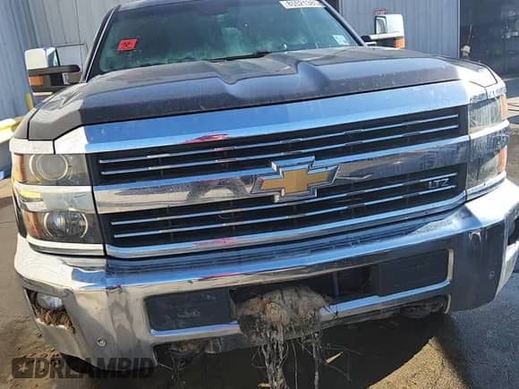 2016 Chevrolet Silverado 2500HD LTZ с VIN 1GC1KWE89GF237125, выставлен на аукционе Copart как лот 85521385 с пробегом Не указан миль и Списание • Salvage title. История ставок и продаж доступна на DreamBid. Изображение 13.