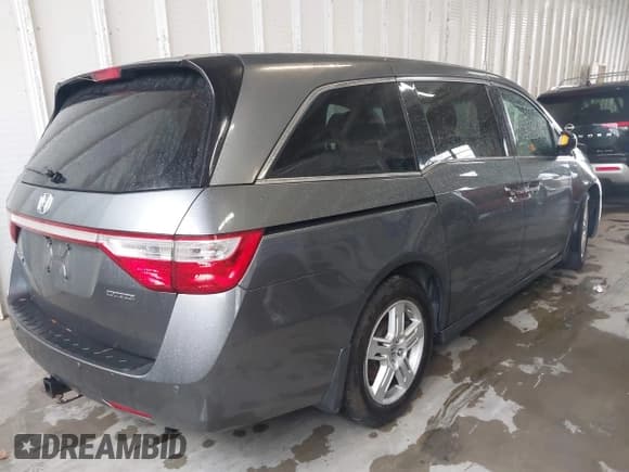 ✅ 2012 Honda Odyssey Touring • VIN: 5FNRL5H92CB106325 • Lot: 43287538. Listed on IAAI with 206,962 mi. Free auction sales archive from the USA and detailed vehicle history report at DreamBid. Image 4.