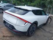 ✅ 2023 Kia EV6 Wind • VIN: KNDC34LAXP5608458 • Lot: 42722937. Listed on IAAI with 22,307 mi. Free auction sales archive from the USA and detailed vehicle history report at DreamBid. Image 4.