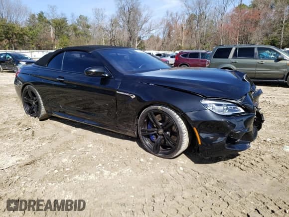 ✅ 2018 BMW M6 • VIN: WBS6G9C50JD950282 • Lot: 46023174. Listed on Copart with 14,184 mi. Free auction sales archive from the USA and detailed vehicle history report at DreamBid. Image 4.